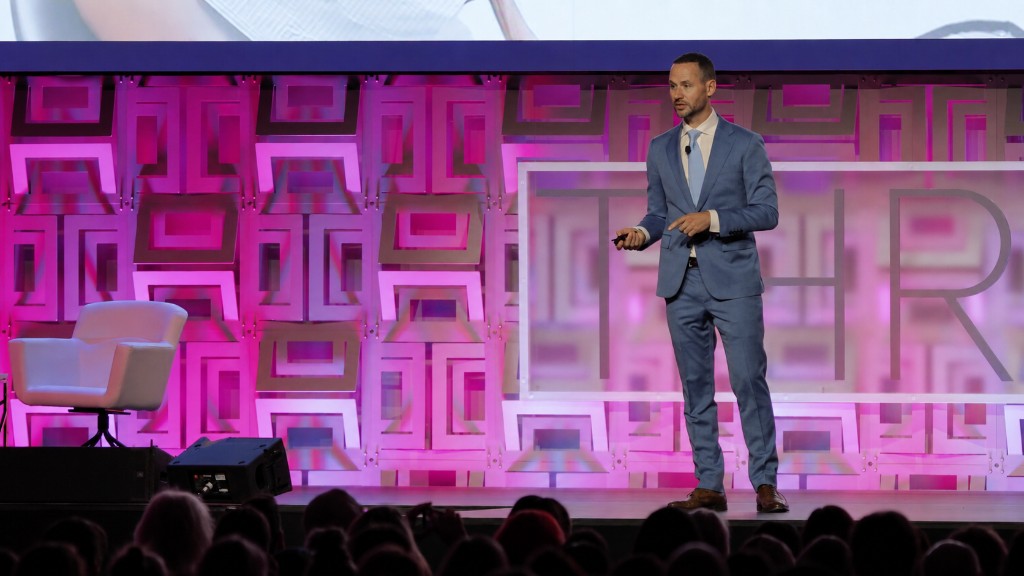 Keynote speaker on stage during a multi-camera conference production